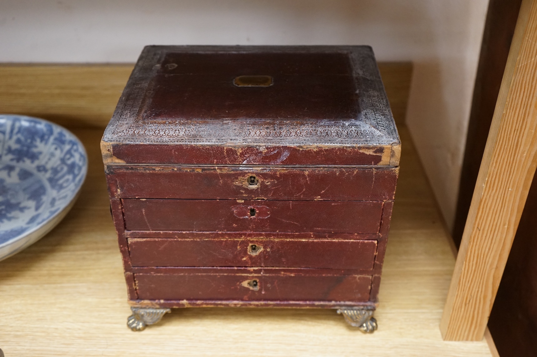 A Regency Morocco leather sewing and writing casket, 26cm and a Chinese Feng shui compass